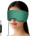 Ultra Soft Heated Eye Mask With Adjustable Warmth For Dry Eyes And Puffy Eyelids Fast Relief For Sinus Pressure And Tension Headaches Hits Different Premium Silk Touch. Woman wearing a silk eye mask with USB connection.