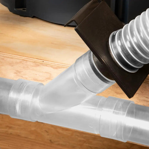 Clear 2-1/2 Inch Y Fitting for Dust Collection Hose connected to dual hoses in a woodworking setup.