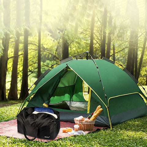 Roomy 96L Duffle Bag For Men And Women Foldable Waterproof Travel Gear Rugged Honeycomb Nylon Build next to green camping tent