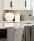 Installed Modern Matte Black Cabinet Pull Handle With Backplate Featuring Grooved Texture And Non Slip Grip for kitchen cabinets