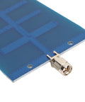 Close-up of Dual Band WiFi Yagi Antenna for FPV Drones, 2.4GHz 12dBi and 5.8GHz 3dBi, showing the SMA connector and PCB material.