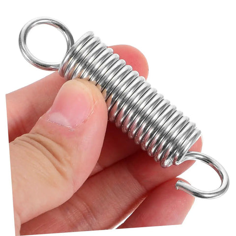 8 Piece Small Extension And Compression Springs With Hook Ends Made From Heavy Duty Stainless Steel For Electric Vehicle Supports And Ladder Feet Reliable Spring Kit That Handles Heavy Loads No Hassle close-up in hand
