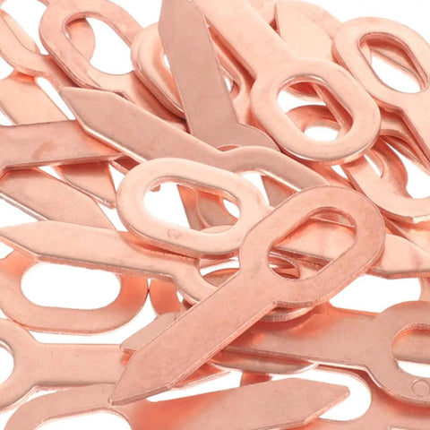 Close-up of copper components from Dent Puller Ring Kit For Auto Body And Sheet Metal Repair 200 Piece Set With Precision Shaping