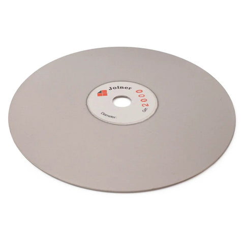 Heavy Duty Six Inch 2000 Grit Diamond Grinding Disc For Gemstone Glass And Rock Polish Tough As Nails For Knockout Lapidary And Hobby Crafting Projects on a white background.
