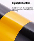 Close-up of highly reflective tape on Heavy Duty Traffic Safety Bollards Constructed Tough With Vivid Reflective Tape For Driveway Barriers And City Streets Premium Steel Warning Stakes Secure Mounting Set.