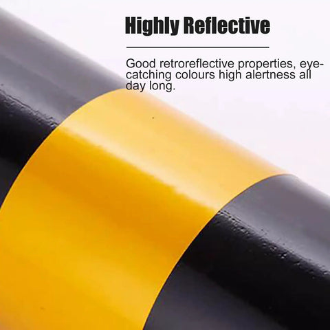 Close-up of highly reflective tape on Heavy Duty Traffic Safety Bollards Constructed Tough With Vivid Reflective Tape For Driveway Barriers And City Streets Premium Steel Warning Stakes Secure Mounting Set.