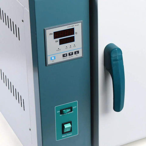 Close-up of the control panel and handle of the Straight Up Digital Convection Oven Featuring Pretty Dang Durable Stainless Steel Interior.