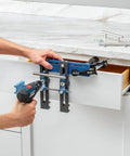 Using Cabinet Hardware Jig And Pull Drill Guide Pro For Easy Install on a drawer, showing adjustable drill guide and knob placement