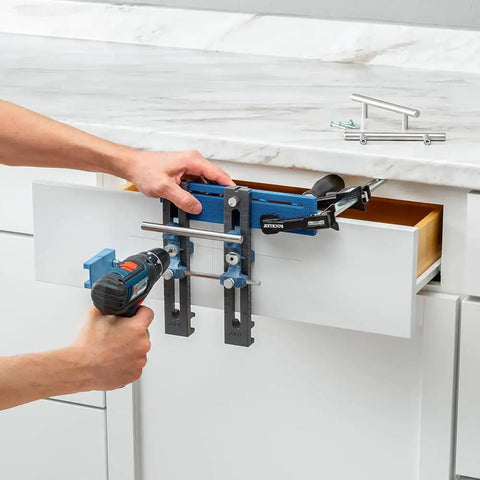 Using Cabinet Hardware Jig And Pull Drill Guide Pro For Easy Install on a drawer, showing adjustable drill guide and knob placement