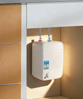 Compact Electric Hot Water Heater Featuring Instant Mini Storage Boiler 1500W sleek rectangular build mounted under kitchen sink.