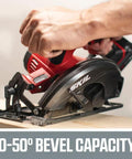 20V Cordless Circular Saw With 6 1/2 Inch Carbide Tip Blade Includes 2 Ah Lithium Battery And Smart Charger cutting wood at an angle.