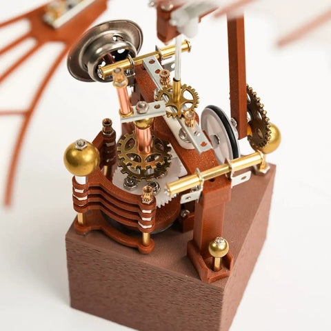 Close-up of Da Vinci Flapping Wing DIY Model Kit 3D Metal Wind Up Ornithopter Battery Free Mechanical Flying Machine components