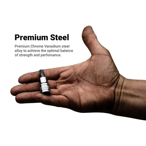 Hand holding a bit from the Master Torx Star Socket Set 60 Piece Drop Forged S2 Steel Bits With Chrome Vanadium Sockets