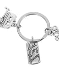 Lightweight Silver Zinc Alloy Camper Keychain with cute camper charm and 'find joy' engraving for travelers and RV enthusiasts