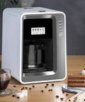 Fully Automatic Bean To Cup Coffee Maker With Built In Grinder Removable Reservoir And Smart Thermal Insulation on a kitchen countertop.