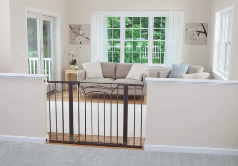 Living room scene with tall and wide baby gate for doorways with easy install no drilling and pressure mount decor friendly design.