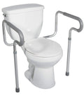 Top Shelf White Bathroom Grab Bar Delivers Rock Solid Elderly Support And Foolproof Installation For Every Standard Toilet Configuration And Home Setup with adjustable aluminum arms on a white toilet.