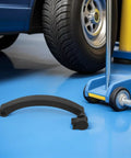 Heavy Duty Wheel Balancer Handle Replacement For Tire Balancing Machine And Rotation Tools With Helluva Grip placed near a car tire.