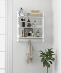 Over Toilet Bathroom Wall Shelf Organizer 3 Tier Wall Mount Shelf Rack With Hooks White Finish holding toiletries and towels