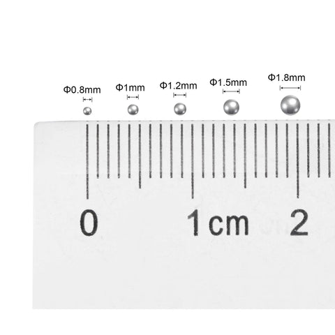 1mm Carbon Steel Bearing Balls G1000 Precision, 10000 Pieces, High Grade Ball Bearings For Industrial Equipment Maintenance And DIY Projects, Cost Effective, Durable, And Smooth For Reuse In Various Mechanical Applications. 1mm steel ball shown on ruler