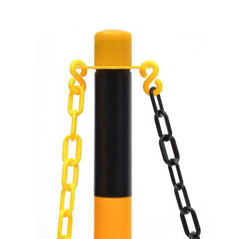 Close-up of Hardcore 6 Pack Safety Bollards With Fillable Base And Interlocking Chains High Visibility Yellow Black plastic post and chains.