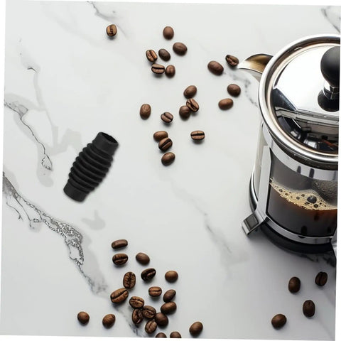 Espresso Steam Wand Heat Insulation Sleeve Anti Burn Rubber Wrap For Coffee Machines next to coffee beans and French press