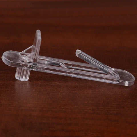 Side view of one clear plastic peg with locking clip from Plastic Shelf Support Pegs And Locking Clips 30 Pack For Wood Shelves Easy Install No Burrs Durable Shelf Pins For Home Office And Store Organization Today