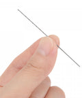 Close-up of a hand holding a single drill from the Ten Pack 0.7mm Mini Micro Twist Drill Bits Set, showing extra long 60mm shank.