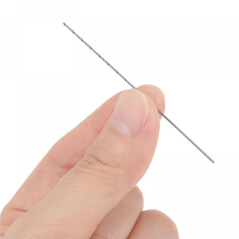 Close-up of a hand holding a single drill from the Ten Pack 0.7mm Mini Micro Twist Drill Bits Set, showing extra long 60mm shank.