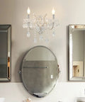 White Crystal Wall Sconce Lighting With Modern K9 Glass Crystal Drops Shade above bathroom mirror