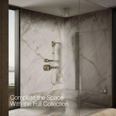 8 Inch Round Rain Showerhead with 2.5 Gpm Drenching Spray, Vibrant Brushed Bronze Finish, Katalyst Spray Technology installed in a modern marble bathroom