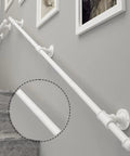 Built Tough Wrought Iron Stair Handrail For Indoor Outdoor Walls Anti Rust Galvanized Support Handle With No Sweat Mounting For Seniors And Kiddos 11.5 Feet Long mounted on wall with clear installation view.