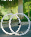Ultra Lightweight Carbon Fiber Road Bike Wheelset with Aero Wave 45/50mm and 60/65mm depths on pavement