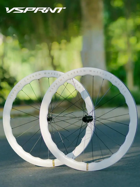 Ultra Lightweight Carbon Fiber Road Bike Wheelset with Aero Wave 45/50mm and 60/65mm depths on pavement