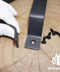 Heavy Duty Solid Steel Barn Door Handle And Closet Pull In Matte Black Powder Coat with screws, close-up view on wooden surface