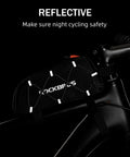 Ride Ready Front Frame Bag For Bikes With Large Capacity Main Compartment, black reflective design, mounted on bike top tube.