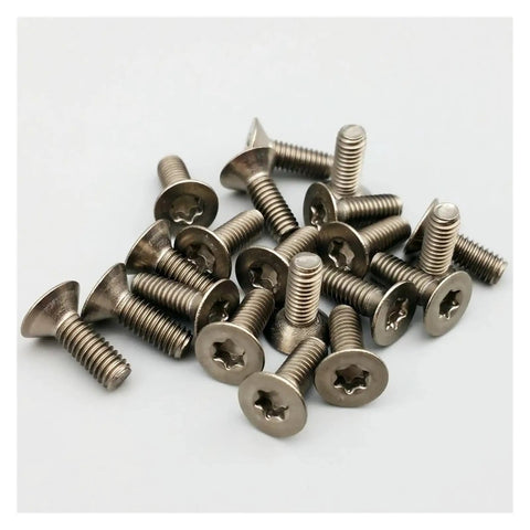 Premium Grade 2 Titanium Countersunk Screw Set Crisp Torx Drive Metric Fasteners For Garage Builds And Bike Mods Rock Solid Dark Grey Finish 12 Piece Pack shown in close-up, highlighting texture and design.