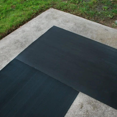 Fine Rib Corrugated Rubber Floor Mat Runner for Indoor Entryways, 3ft by 10ft, Black, laid on concrete patio