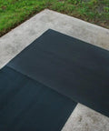 Black fine rib corrugated rubber floor mats for indoor entryways, 3ft by 15ft runner on concrete, built tough to scrape dirt.