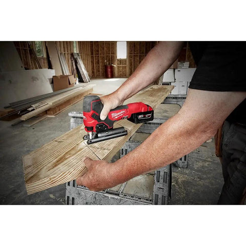 18V Cordless Jig Saw With Barrel Grip in use cutting a wood plank, showing precise handling for DIYers and pros, bare tool only