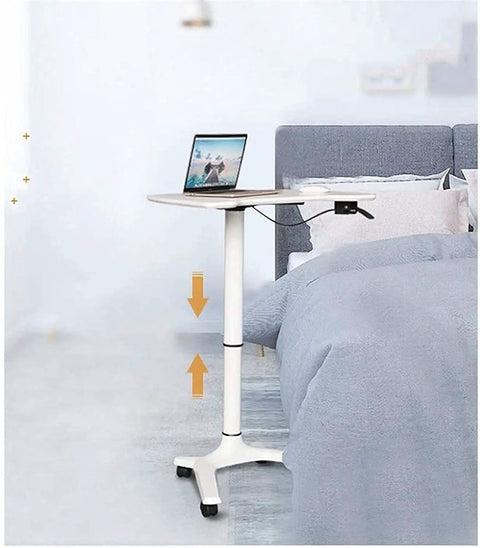 Rock Solid Rolling Laptop Cart With Height Adjustable Standing Desk and Smooth Glide Wheels For Bed Sofa Gaming Or Home Office Flex Setup next to bed.
