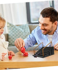 Father and child playing with Fingerboard Skateboard Ramp Set Two Piece Mini Skatepark Obstacle Accessories at a table.