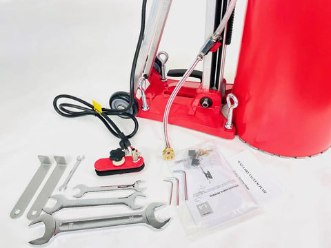 Straight Shooting Heavy Duty Workhorse Diamond Coring Drill With Tilting Rolling Base And Killer 12 Piece Wet Core Bit Set Pro Concrete Cutting Setup 110 Volt Dual Speed 2600 Watt Motor Crushes 12 Inch Cuts with tools and accessories.