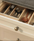 Drawer with cutlery and Six Pack Antique Brass Cabinet Knobs With Fluted Trumpet Ends Art Deco Inspired T Bar Handles on white cabinet