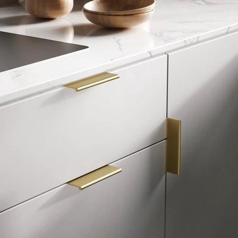 Six Pack Adhesive Cabinet Handles in gold finish on kitchen drawer, no drill, easy install, aluminum alloy, 100mm length