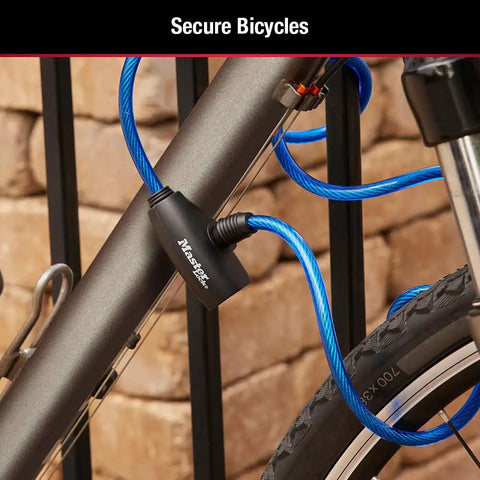 Bike Lock Cable Set With Keys 3 Pack Keyed Alike 6 Ft Long Braided Steel Cables securing a gray bike to a metal fence outdoors.