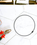Premium Nickel Chromium Heating Element Replacement Strip For Heat Shrink Film Sealer on a work surface with tools.