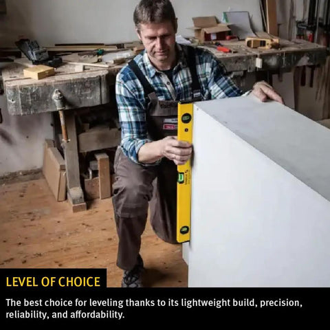 Man using 48 Inch Heavy Duty Aluminum Spirit Level Featuring Dead On Accuracy on a white panel in a workshop.