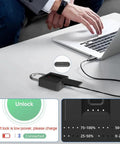 Beefy Biometric Fingerprint Padlock With Bluetooth App Control charging via laptop on a table