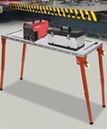 Heavy Duty Welding Table With 1000 Pound Load Rating Fold Flat Steel Workbench with tools on top and height adjustable legs.